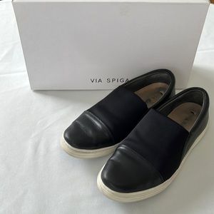 Via Spiga black leather slip on shoes.